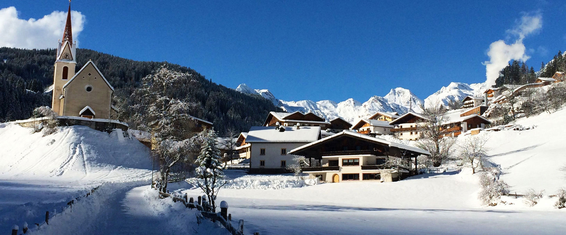 Ratschings View of Ratschings mit parish church & snow landscape